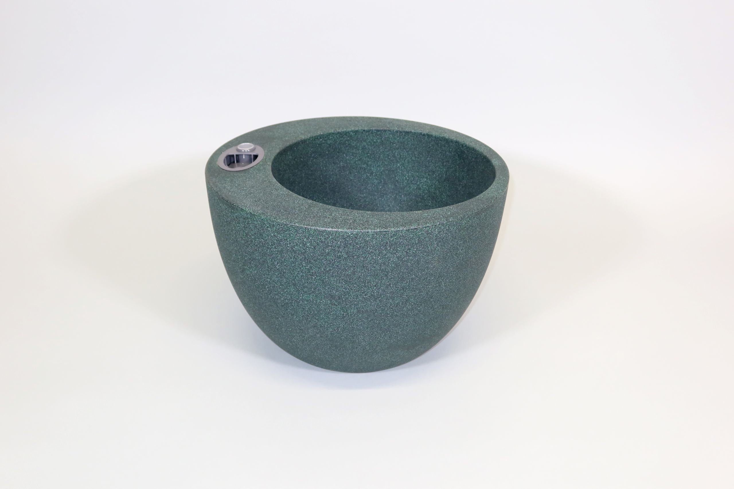 Selbstbewässerndes Pflanzgefäß „podd PROMNITZ“ in der Farbe Olivgrün Naturstein